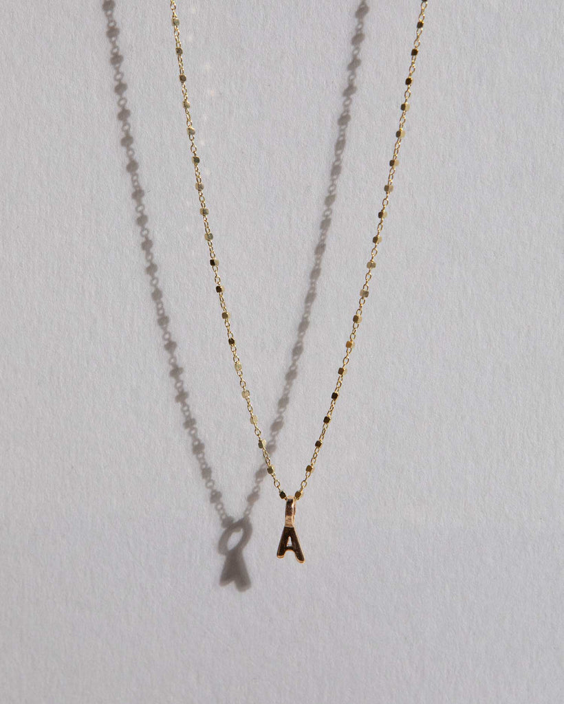 Recycled 9ct solid gold chain with 9ct solid gold initial charm handmade in London by Maya Magal London