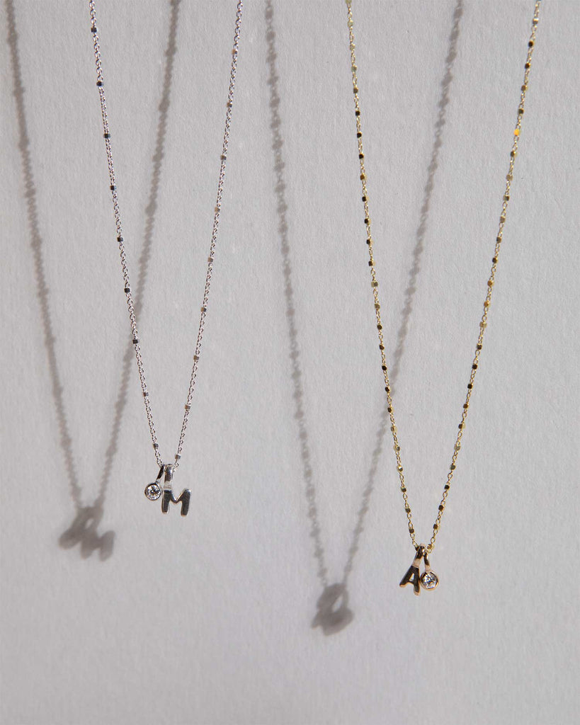 Recycled 9ct solid gold chain with initial charm and lab-grown diamond charm handmade in London by Maya Magal London