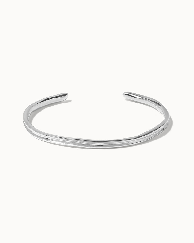 Recycled sterling silver adjustable concave bangle handcrafted in London by Maya Magal London