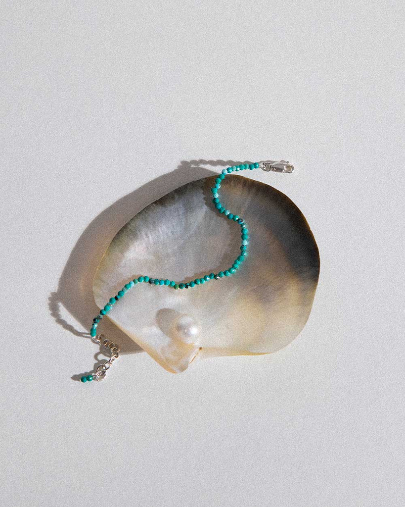 turquoise beaded bracelet handstrung on silk thread handcrafted in London with 925 sterling silver by Maya Magal London