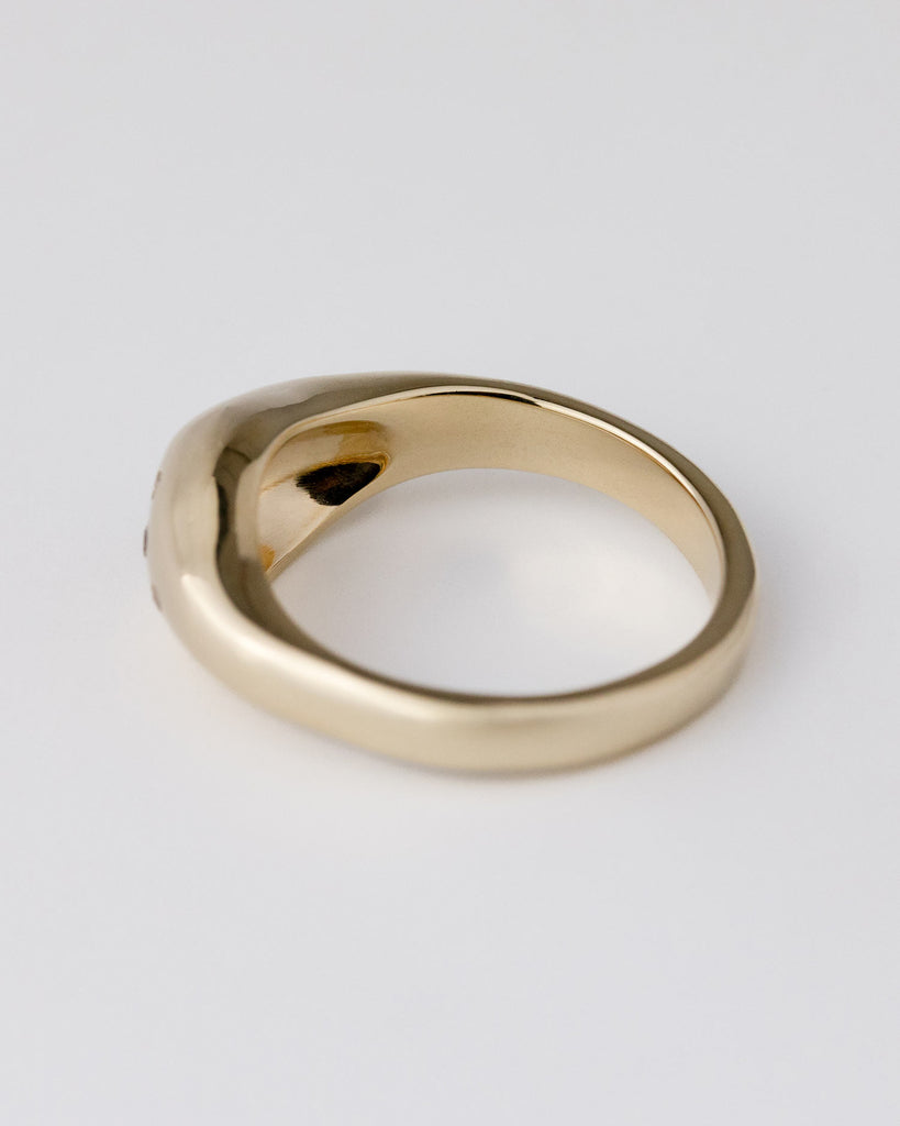 Recycled 9ct solid yellow gold sculptural signet ring with finely set white and champagne natural diamonds handcrafted in London by Maya Magal London