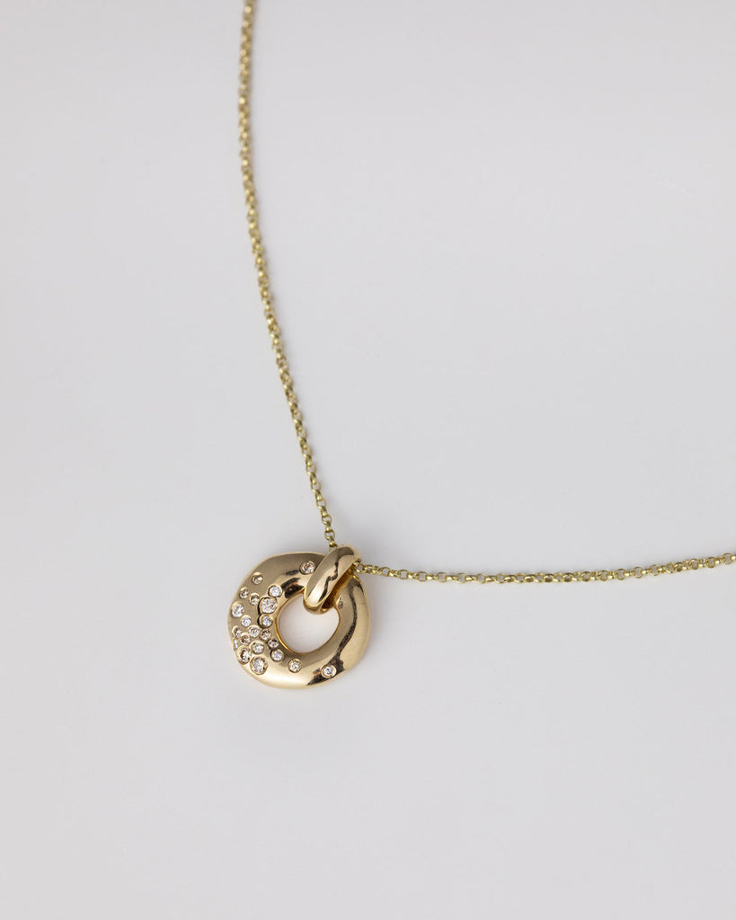 Recycled 9ct solid yellow gold charm necklace with finely set white and champagne natural diamonds handcrafted in London by Maya Magal London