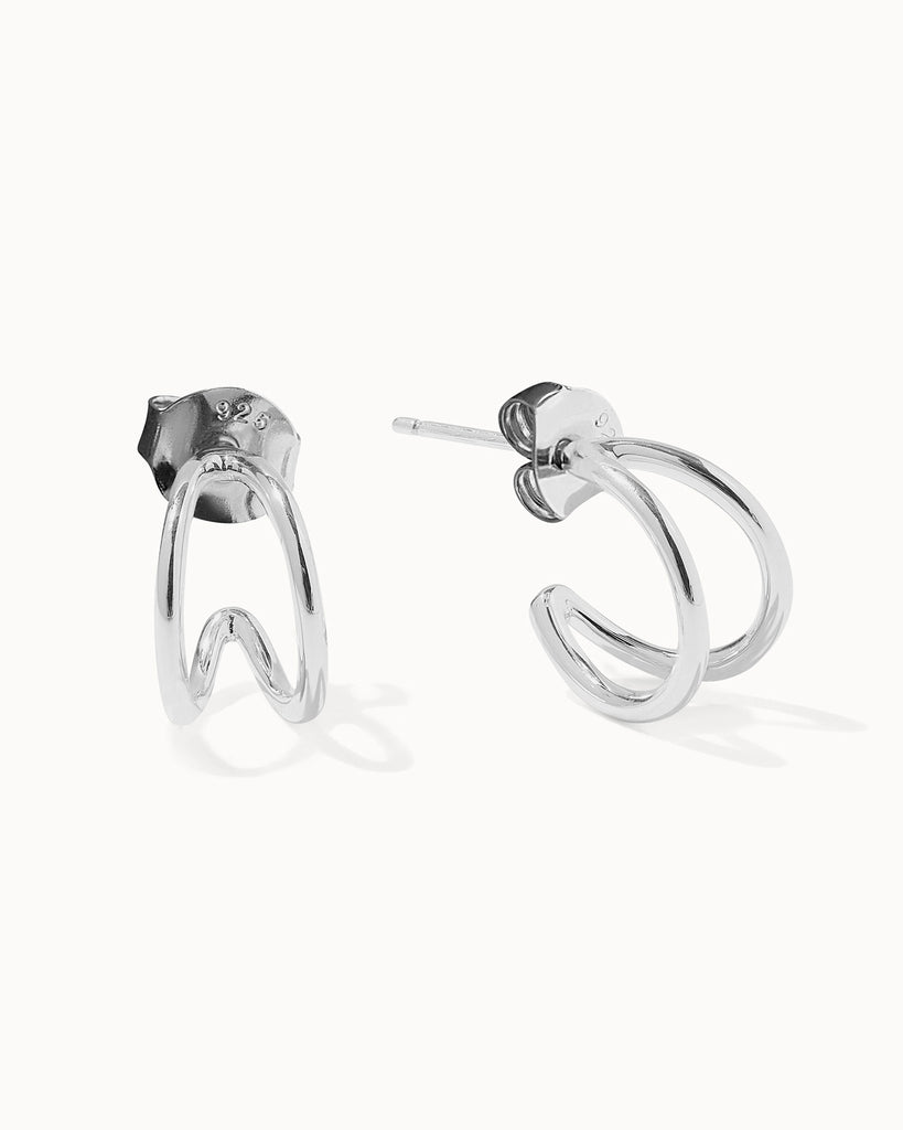 Recycled 925 sterling silver huggie hoop earrings handcrafted in London by Maya Magal London