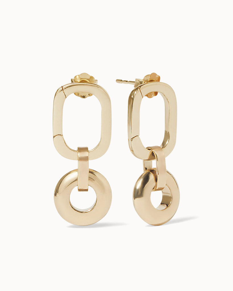 Recycled 9ct solid gold oval hoop earrings with 9ct solid gold open circle charms handmade in London by Maya Magal London