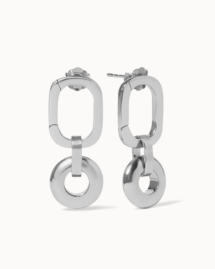 Recycled 925 sterling silver oval hoop earrings with 925 sterling silver open circle charms handmade in London by Maya Magal London