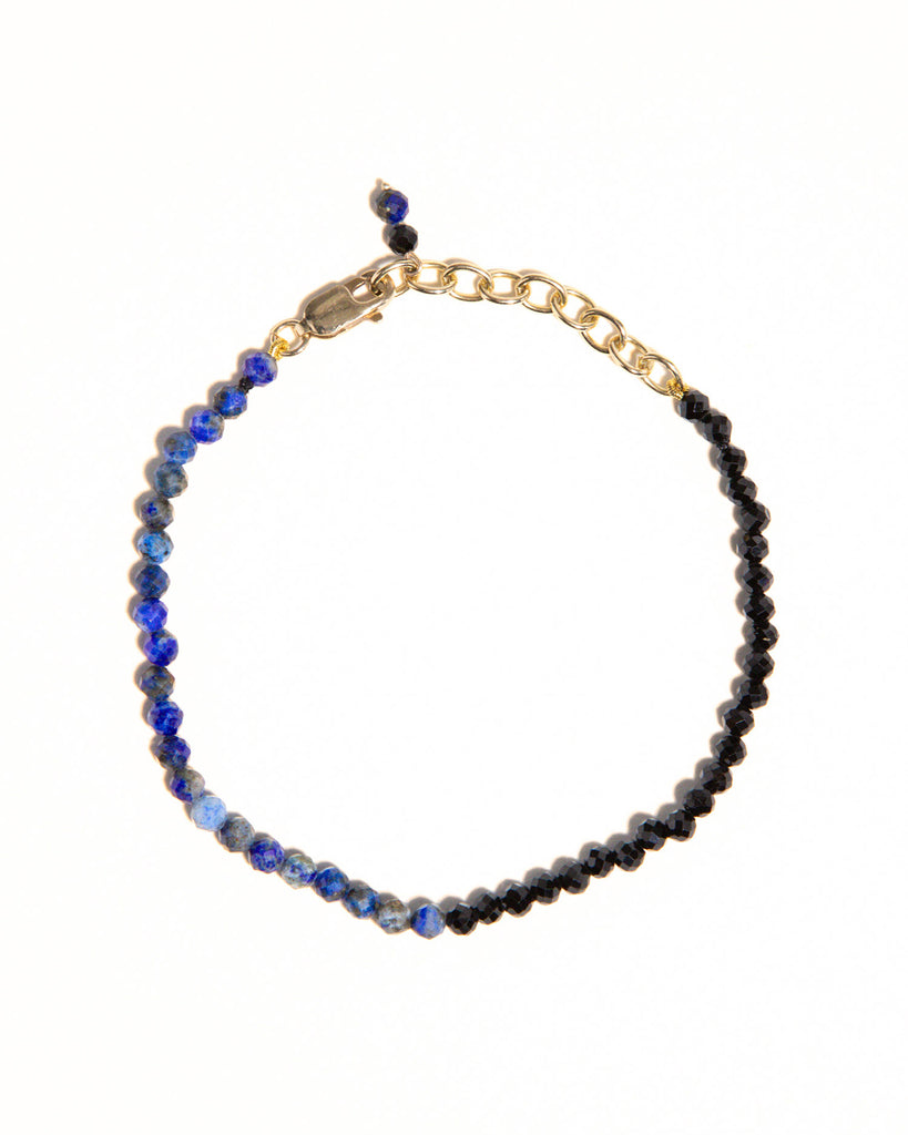 Blue lapis and black spinnel beaded bracelet handstrung on silk thread handcrafted in London with 9ct solid gold by Maya Magal London