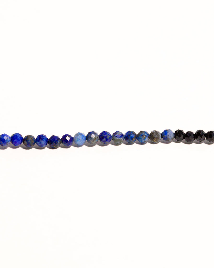 Blue lapis and black spinnel beaded necklace handstrung on silk thread handcrafted in London with 9ct solid gold by Maya Magal London