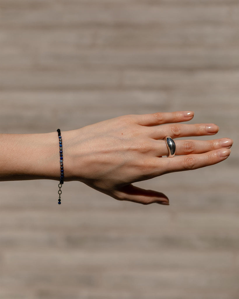 Blue lapis and black spinnel beaded bracelet handstrung on silk thread handcrafted in London with 9ct solid gold by Maya Magal London