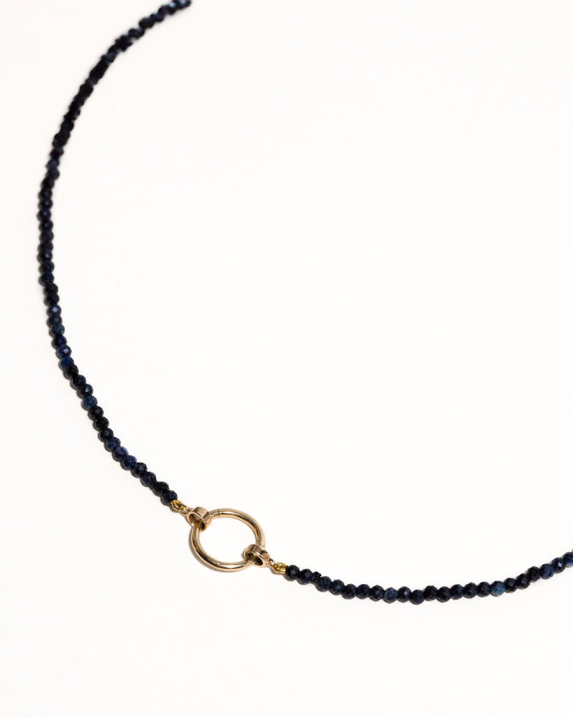 Blue sapphire beaded necklace handstrung on silk thread handcrafted in London with 9ct solid gold by Maya Magal London