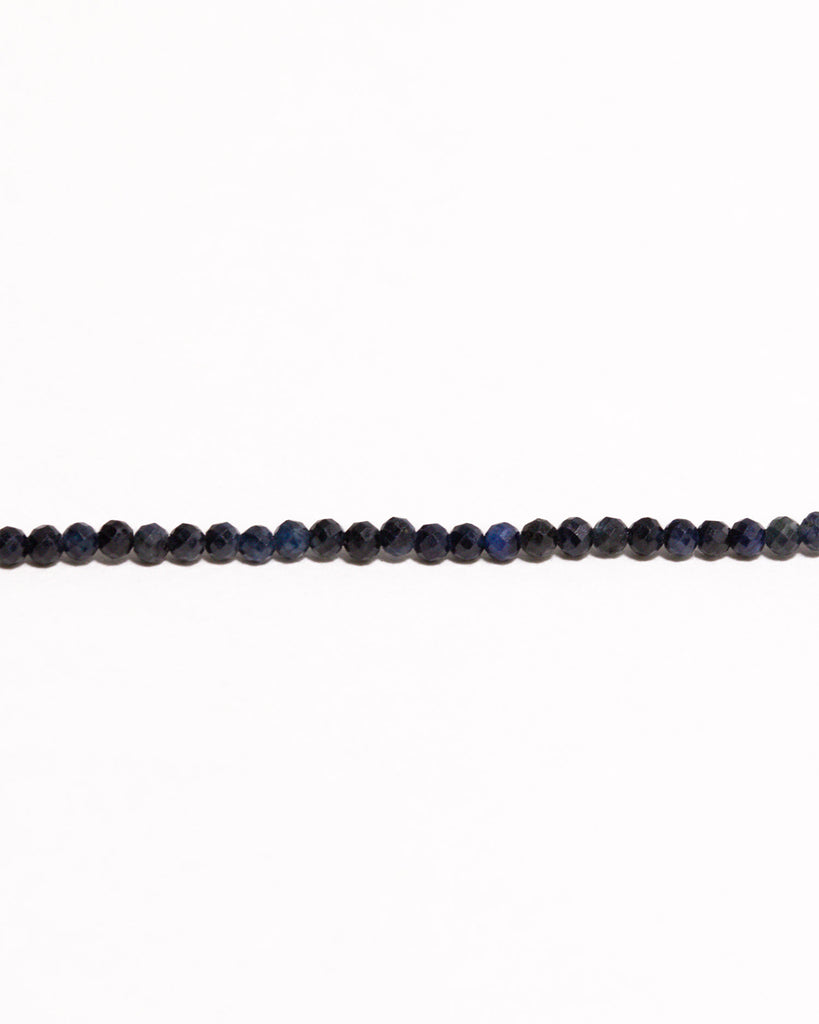 Blue sapphire beaded necklace handstrung on silk thread handcrafted in London with 9ct solid gold by Maya Magal London