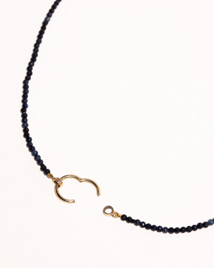 Blue sapphire beaded necklace handstrung on silk thread handcrafted in London with 9ct solid gold by Maya Magal London