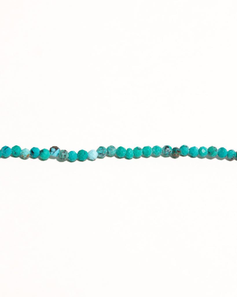 turquoise beaded bracelet handstrung on silk thread handcrafted in London with 925 sterling silver by Maya Magal London