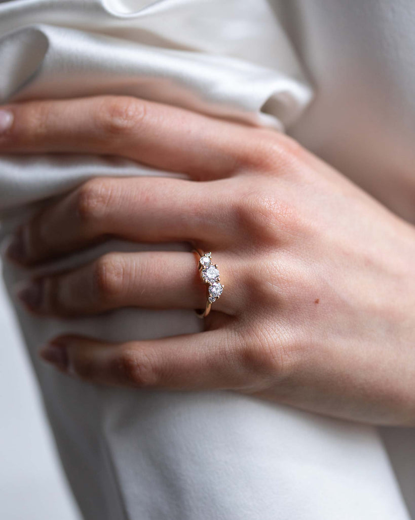 Cluster ring with lab grown white diamonds set in a recycled 9 ct solid yellow gold band handcrafted in London by Maya Magal