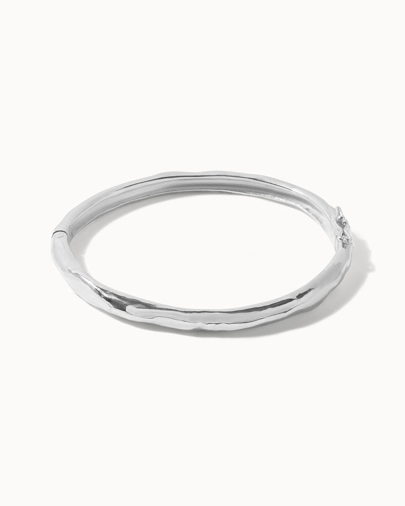 Recycled 925 sterling silver molten hinged bangle handcrafted in London by Maya Magal London