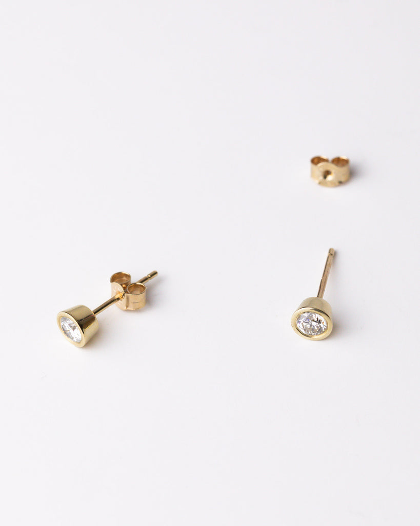 0.25ct lab grown white brilliant cut diamond stud earrings set in 9ct solid yellow gold Handcrafted in London by Maya Magal London