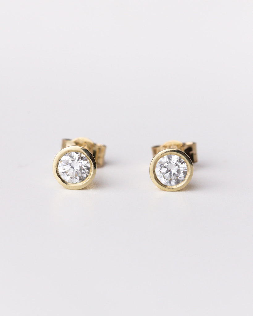 0.25ct lab grown white brilliant cut diamond stud earrings set in 9ct solid yellow gold Handcrafted in London by Maya Magal London