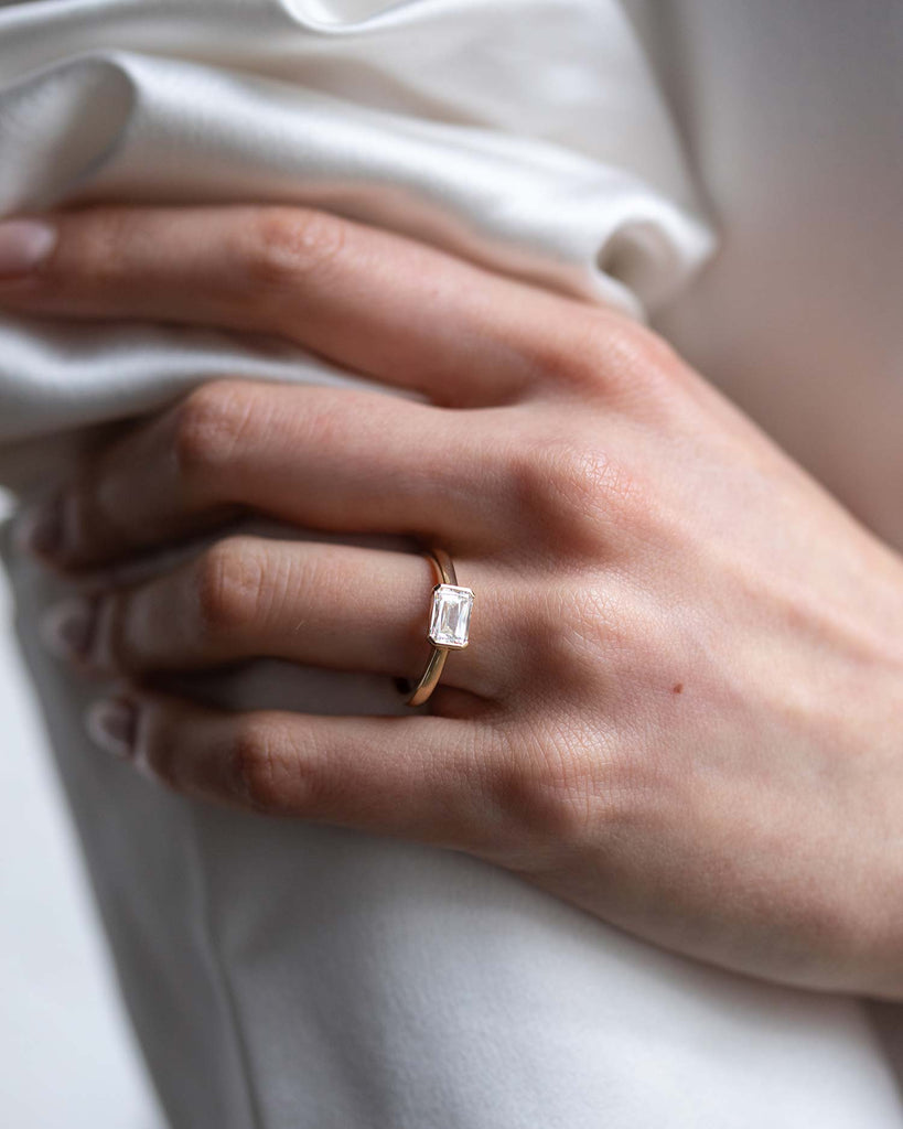 Scissor cut lab grown white diamond solitaire ring set in a recycled 9 ct solid yellow gold band handcrafted in London by Maya Magal