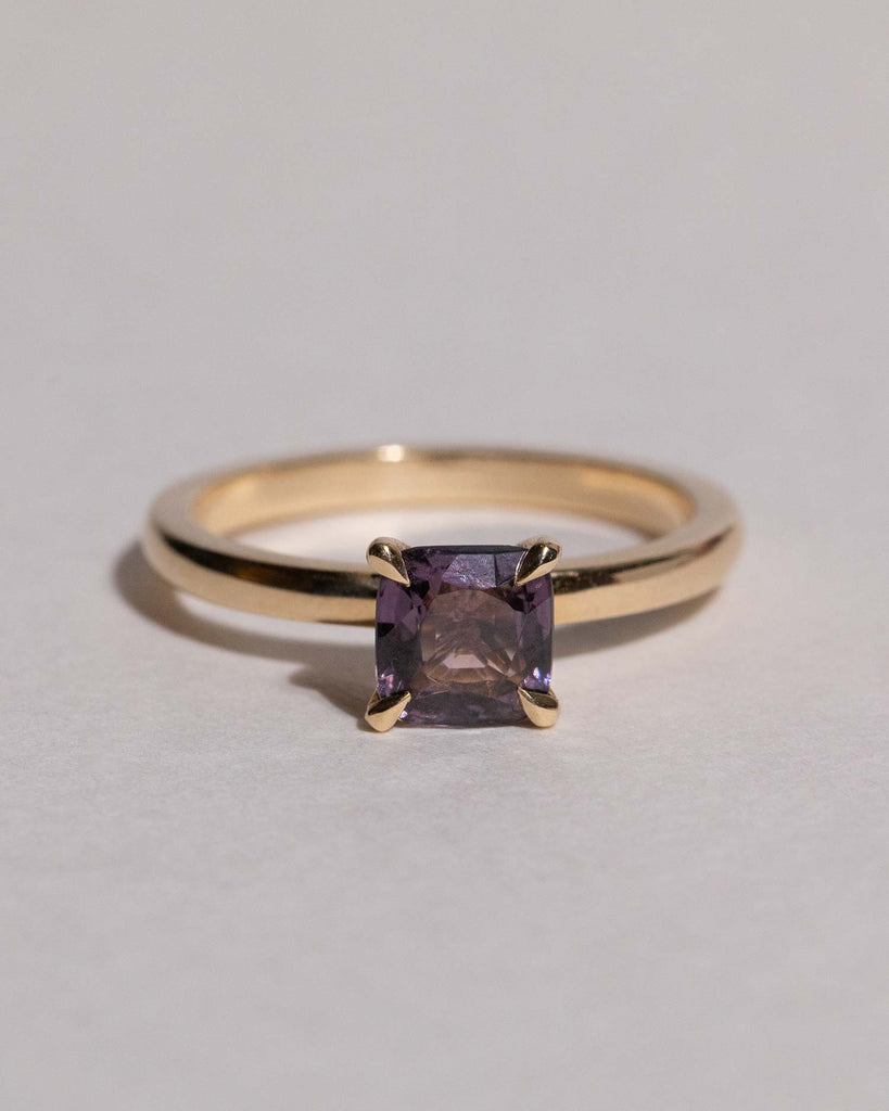 Purple Spinel solitaire engagement ring   set on a recycled solid gold band handmade in London by Maya Magal London