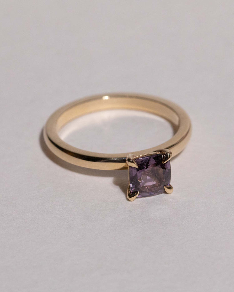 Purple Spinel solitaire engagement ring   set on a recycled solid gold band handmade in London by Maya Magal London