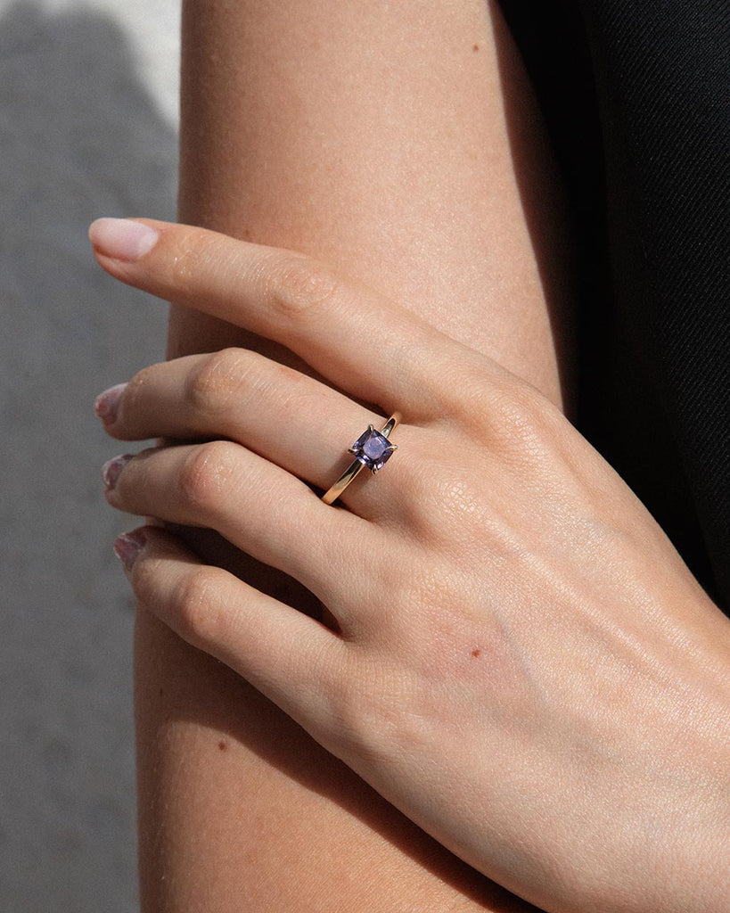 Purple Spinel solitaire engagement ring   set on a recycled solid gold band handmade in London by Maya Magal London