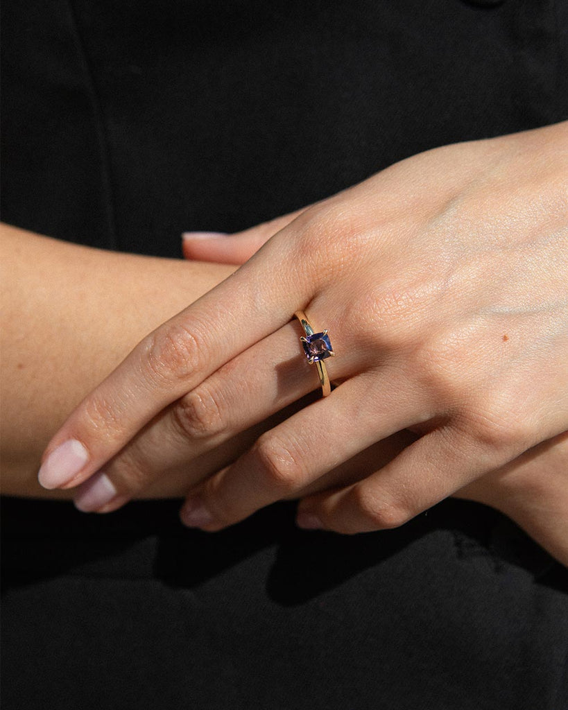 Purple Spinel solitaire engagement ring   set on a recycled solid gold band handmade in London by Maya Magal London