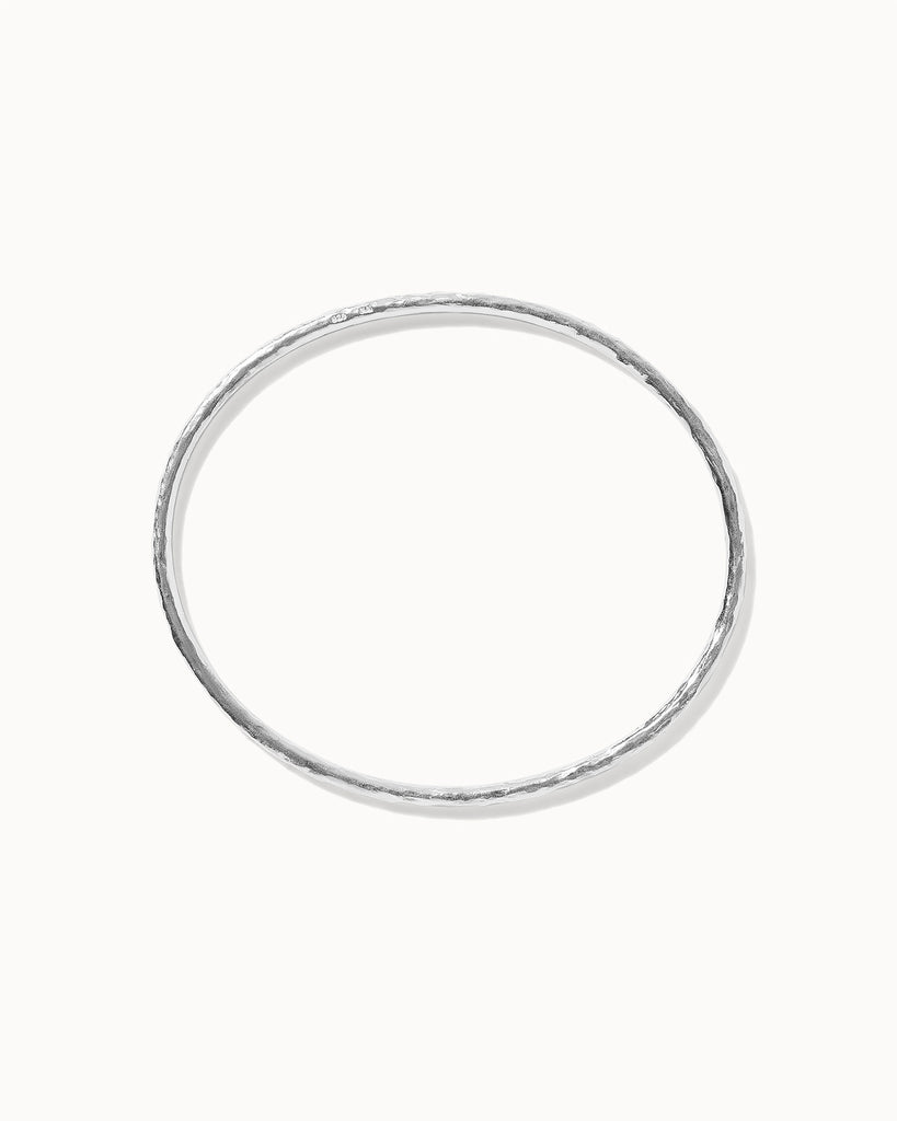 sterling silver bangle with hammered texture handcrafted in London by Maya Magal London