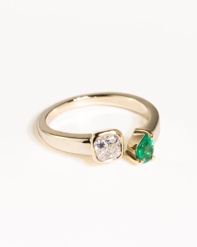 toi et moi ring with 0.36ct lab grown diamond and pear cut emerald handcrafted in London by Maya Magal London