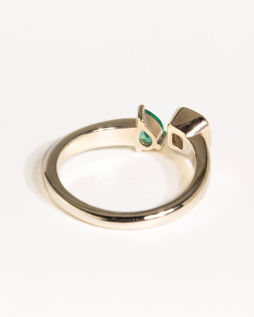 toi et moi ring with 0.36ct lab grown diamond and pear cut emerald handcrafted in London by Maya Magal London