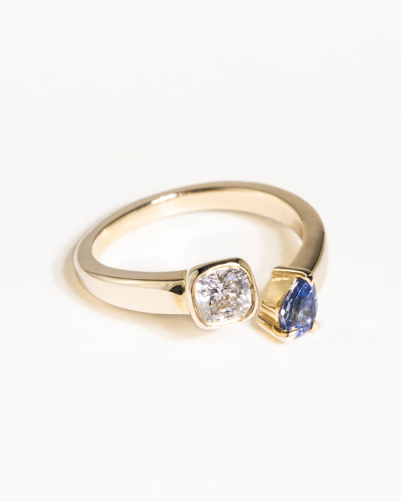 toi et moi ring with 0.36ct lab grown diamond and pear cut sapphire handcrafted in London by Maya Magal London