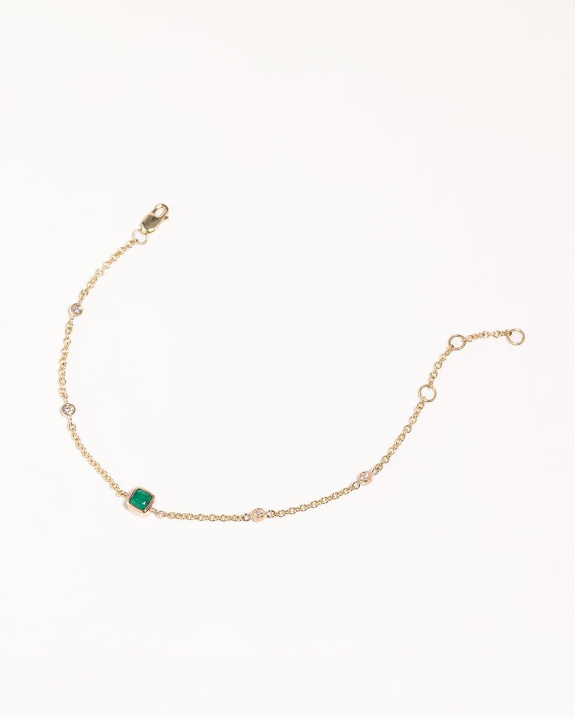 recycled 9ct solid gold bracelet with lab grown diamonds and cushion cut emerald handcrafted in London by Maya Magal London