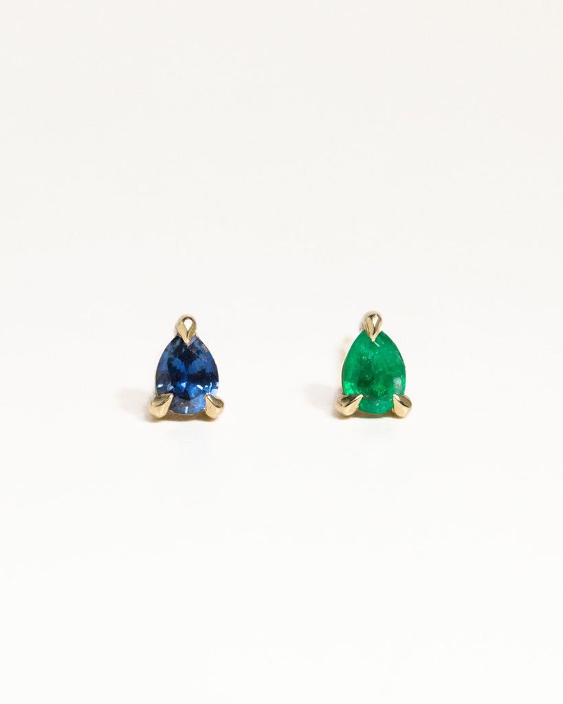 pear cut natural sapphire stud earring encased in recycled solid gold handcrafted in London by Maya Magal London