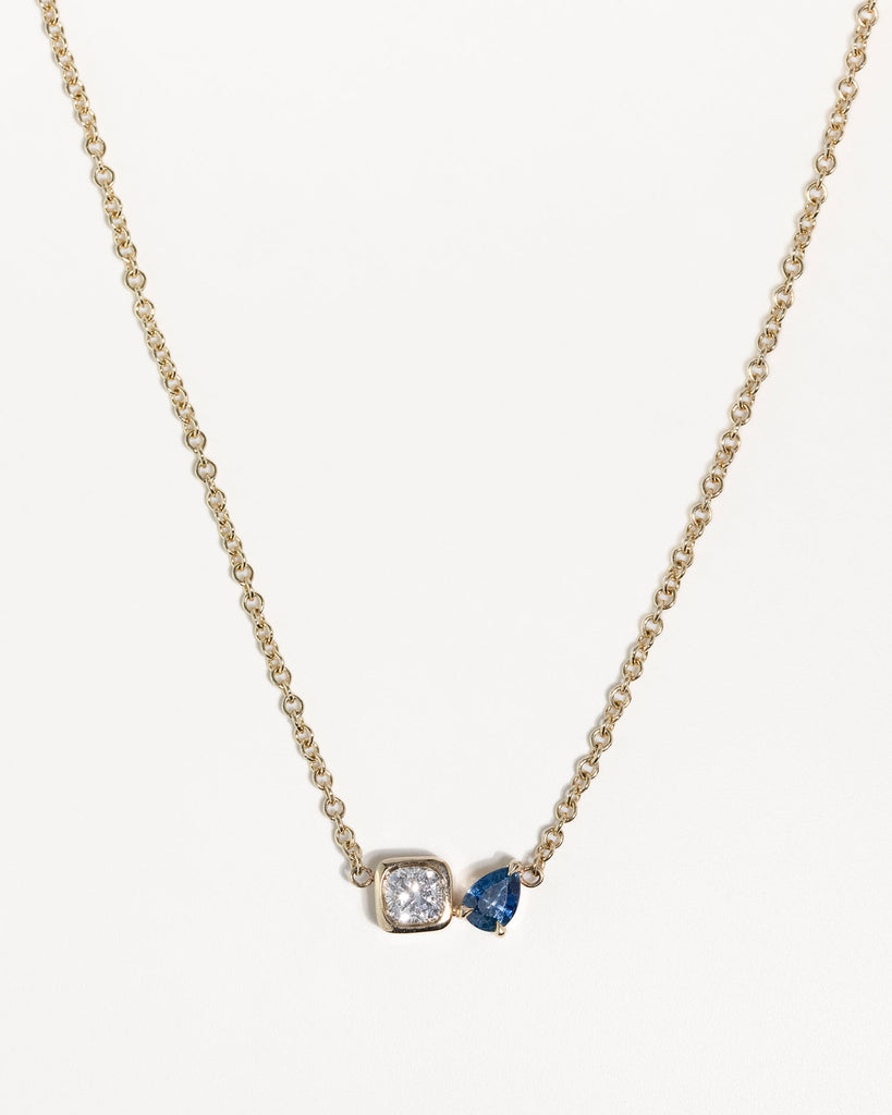 toi et moi necklace with 0.36ct lab grown diamond and pear cut sapphire handcrafted in London by Maya Magal London