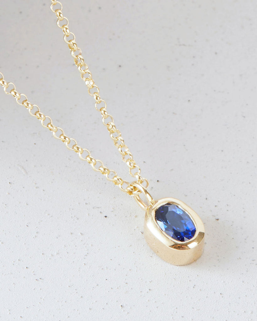 9ct Solid Gold Heirloom Oval Sapphire Necklace handmade in London by Maya Magal sustainable jewellery brand